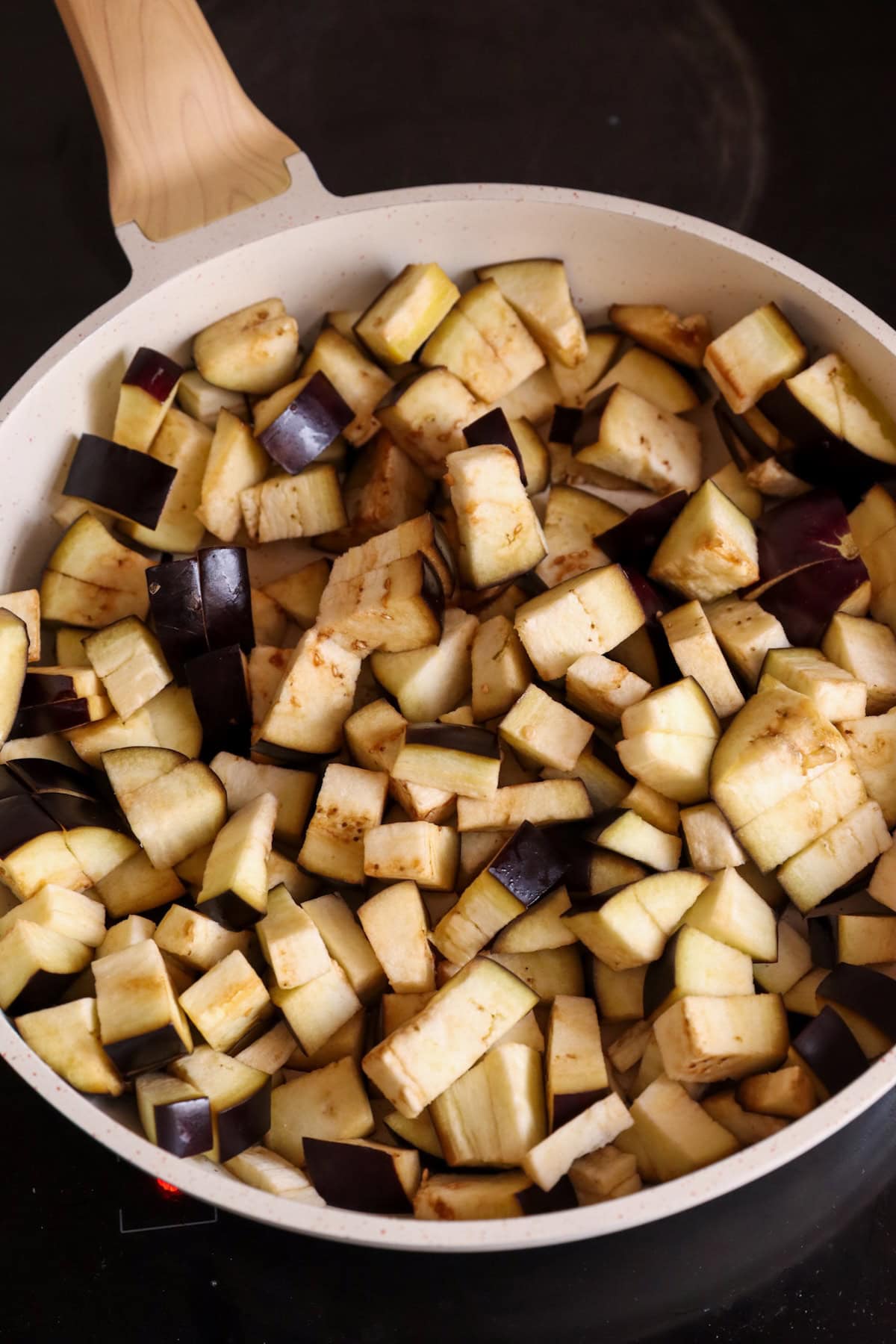 aubergine added to pan